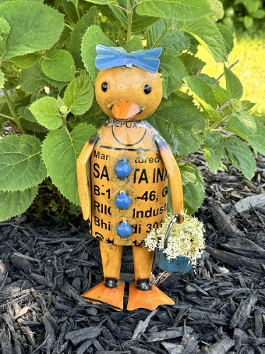ELLA DUCK HOLDING A BLUE BUCKET AVAIL JAN 2026